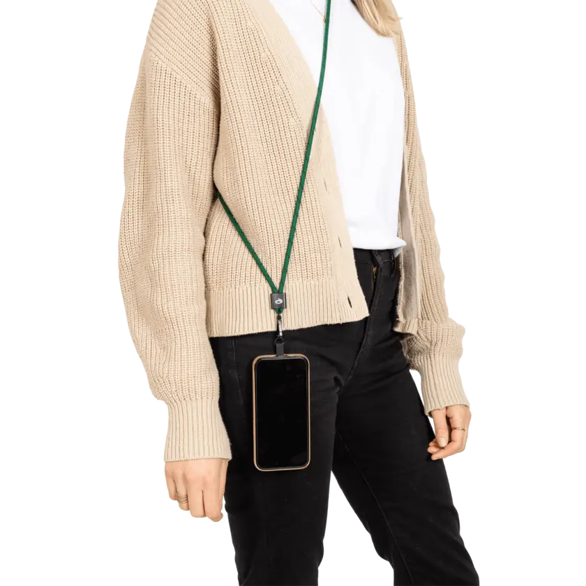 green phonestrap around shoulder